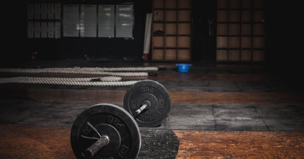  demanding fitness hustle fitness belfast A lone barbell rests in an empty, dimly lit gym, emphasizing strength and solitude.