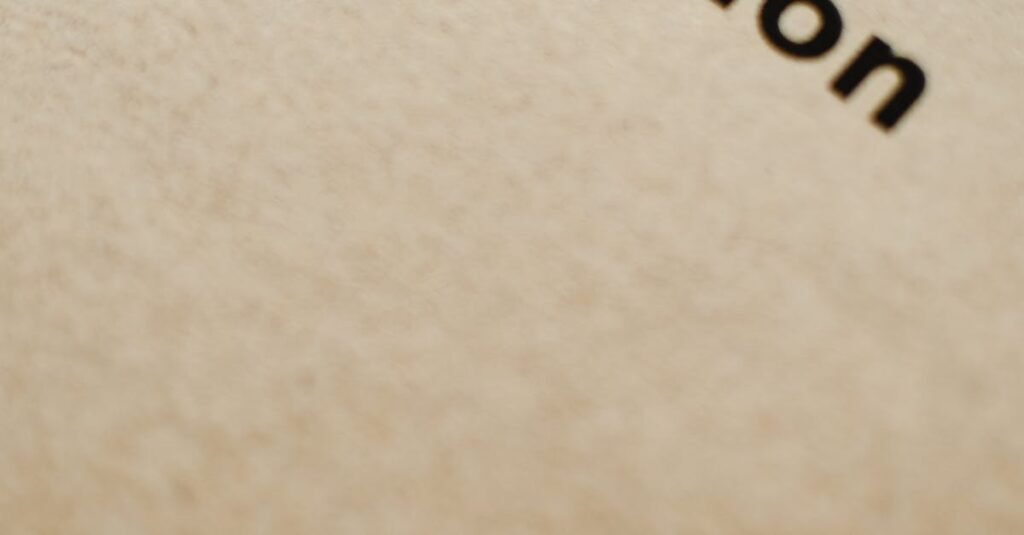 Close-up of the word 'motivation' printed on a brown paper background.