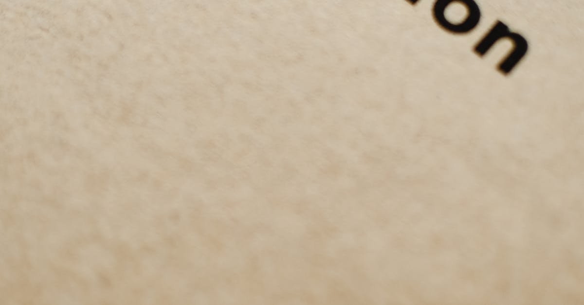 Close-up of the word 'motivation' printed on a brown paper background.